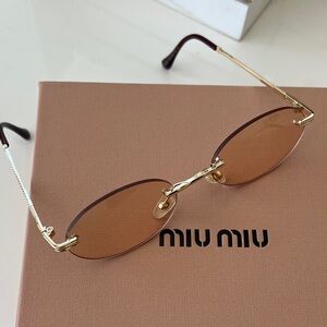 Gold Frameless Sunglasses with Brown Lenses